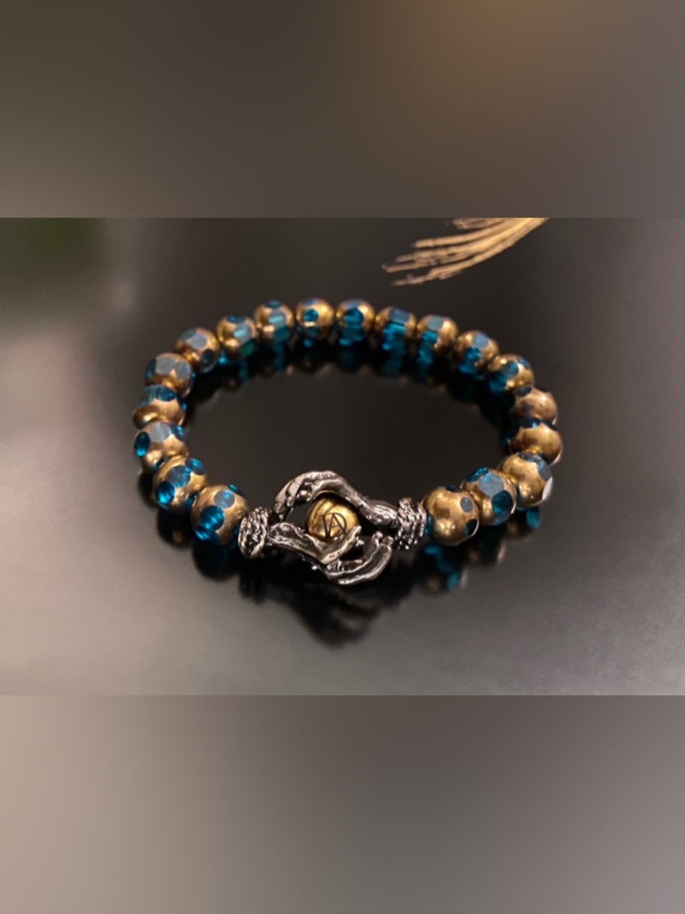8mm Blue and Gold Beaded Bracelet with Decorative Silver Clasp